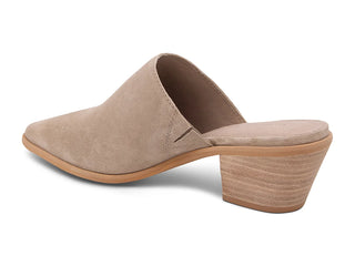 A single taupe suede mule shoe with a low block heel, shown from a side profile view on a white background.