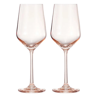 Two clear stemmed wine glasses with a subtle pink tint, shown side by side on a plain white background.