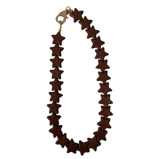 A necklace made of dark brown star-shaped beads with a gold lobster clasp, displayed on a light gray background.
